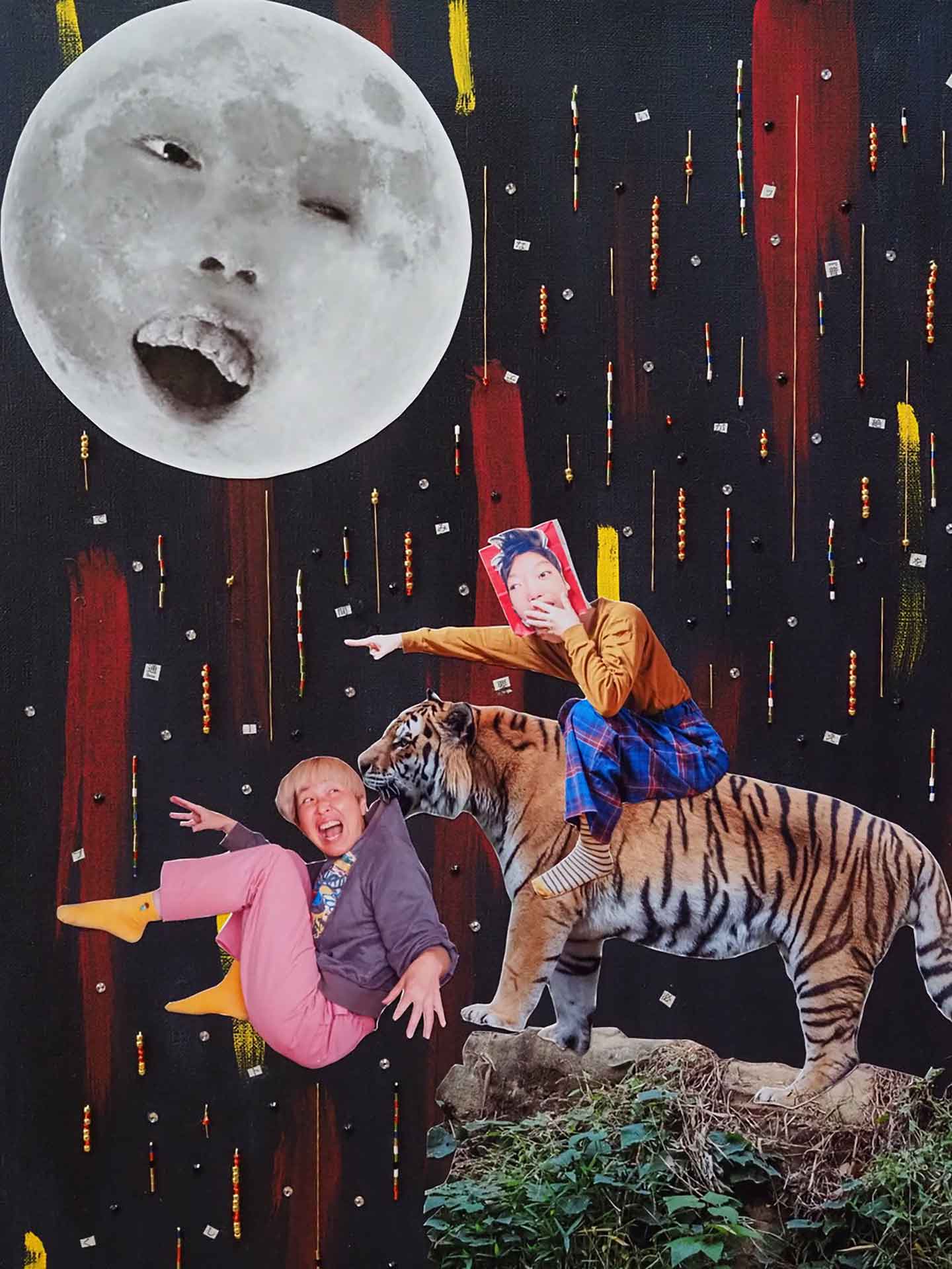 背中に瑞樹さんを乗せた虎が、山本さんを咥えて崖から落とそうとしているコラージュ作品